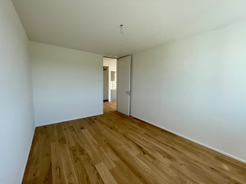 TOP: Wohnen mit Weitblick | Moderne 2.5 Zimmer Neubauwohnung mit grosser Terrasse (10)