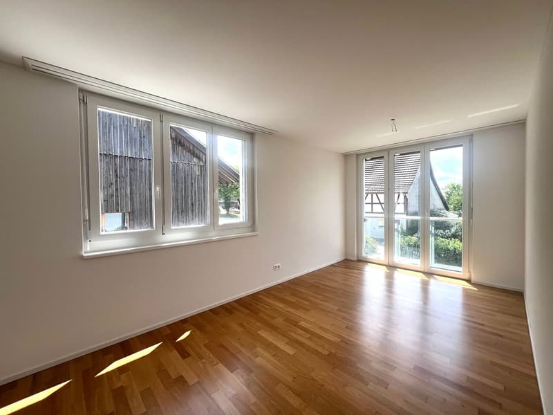 empty room, wooden floor, white walls, large windows, sliding glass doors