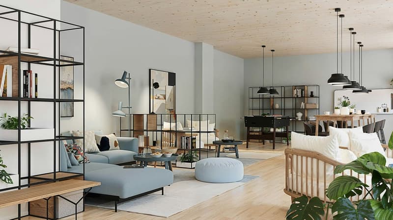 Cozy living area with gray couch, white cushions, white round ottoman, round coffee table, floor lamps, wooden floor, gray wall, hanging lamps, metal shelves, dining table, chairs, dining cabinet, picture frames