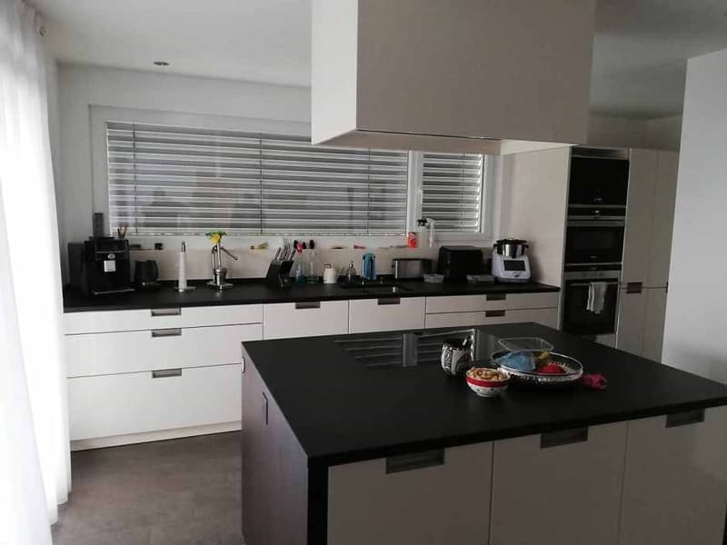 Appartement de jardin exclusif de 4,5 pièces avec double garage et extérieur de rêve (4)