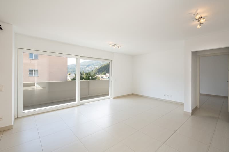 empty room, white tiles, sliding glass doors, balcony, mountain view