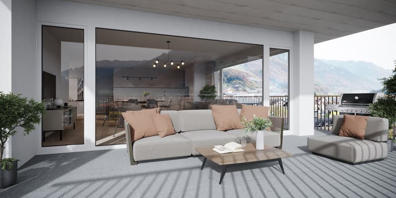 modern living room with gray sofa, coffee table, glass doors, balcony, mountain view