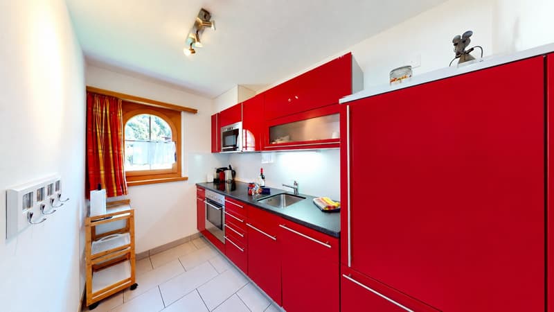Stilvolle und volleingerichtete 2½-Zimmer-Wohnung mit Gartensitzplatz in Klosters (10)