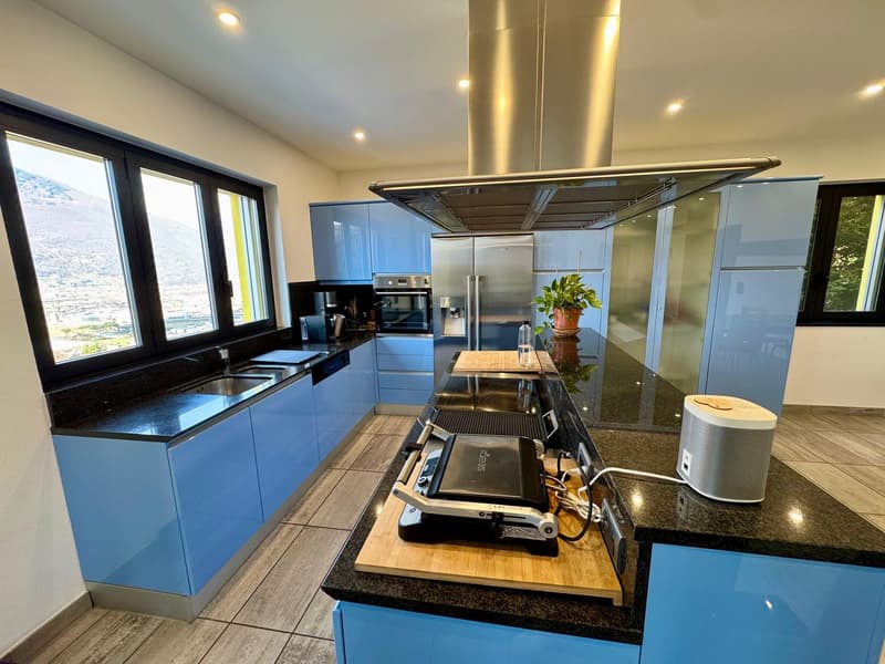 Camorino – Semi-detached house consisting of two independent apartments with stunning panoramic views and swimming pool (6)