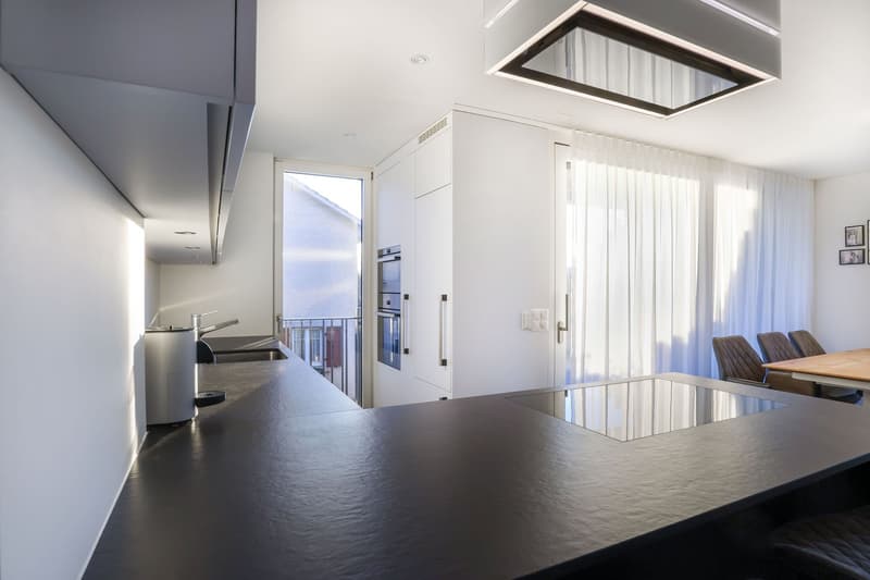 modern kitchen, glass cooktop, built-in oven, dishwasher, stainless steel appliances, granite countertops, marble flooring, recessed lighting, modern faucet