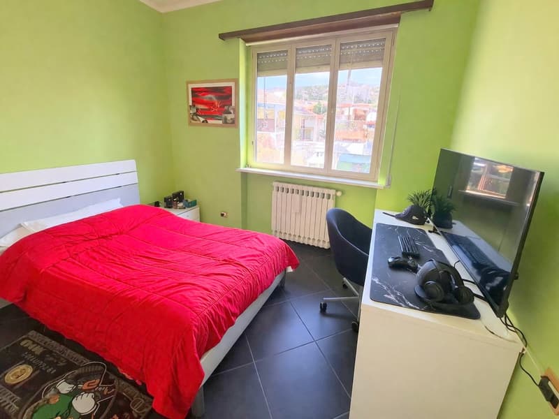 Bright 4-Room Apartment with Balcony and Garage in Bizzarone (8)