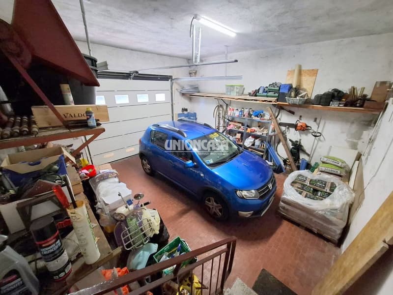 Einfamilienhaus mit Garten und Garage in Bizzarone (27)