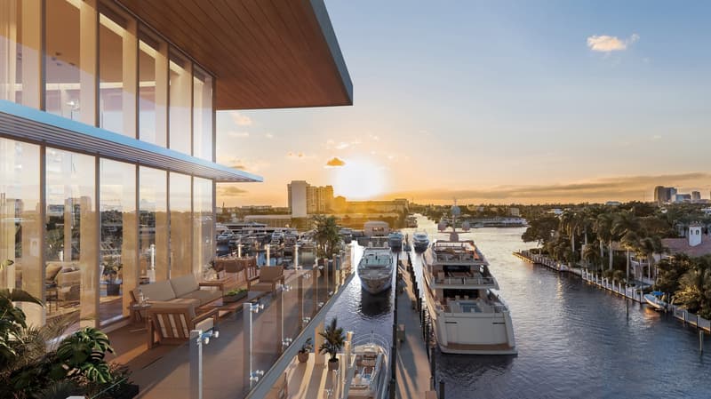 modern building, glass walls, balcony, view of the river, docked boats