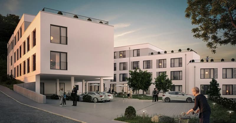 Modern apartment building, white exterior, multiple balconies, parking area, trees, and shrubs