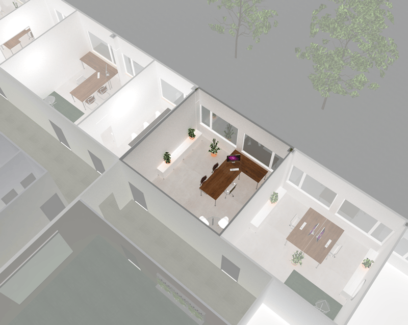 office space with desks, chairs, and plants