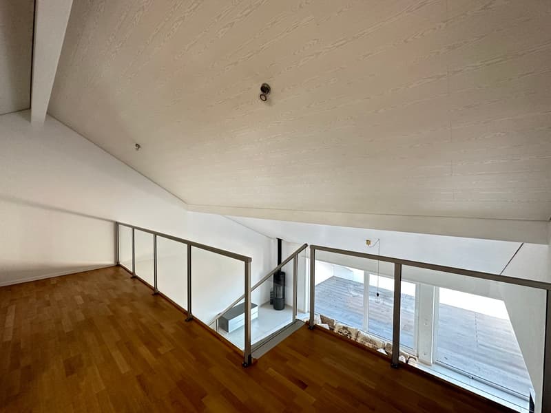 wooden floor, white walls, glass railings, metal handrails, glass windows, metal pipe
