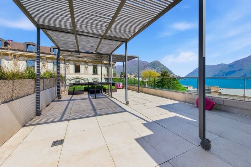 Exclusive penthouse with panoramic rooftop and breathtaking views over Lake Lugano (1)