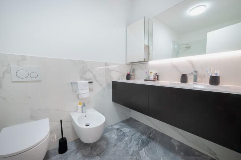 Elegant maisonette apartment with a double garden in Montagnola. (13)
