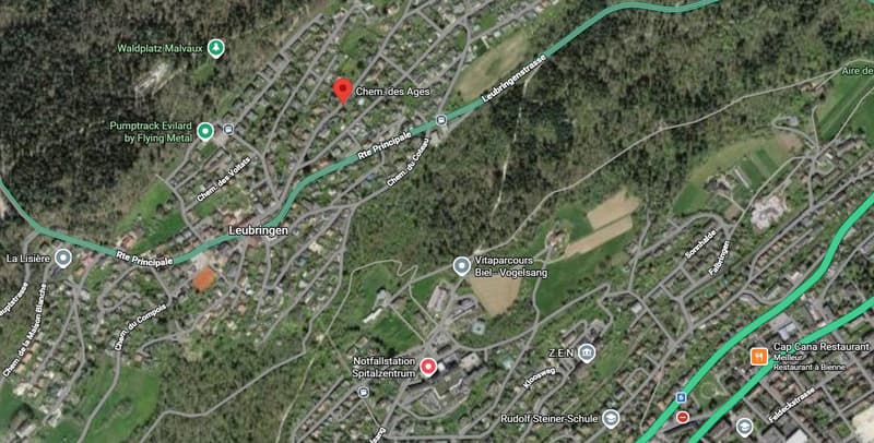 Aerial map of a town with roads, buildings, and landmarks