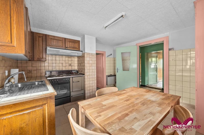 Maison villageoise de deux appartements à rénover à Beuson (4)