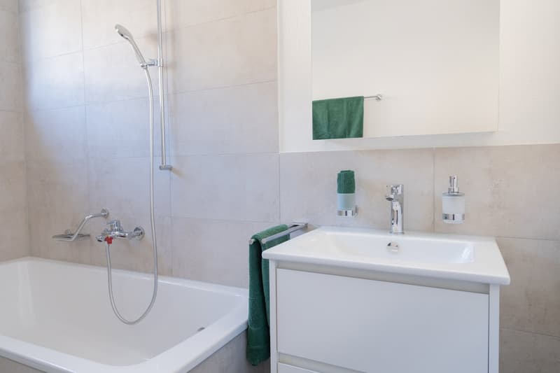 Exclusive 5.5-room attic apartment in Hergiswil – New building with mountain view (8)