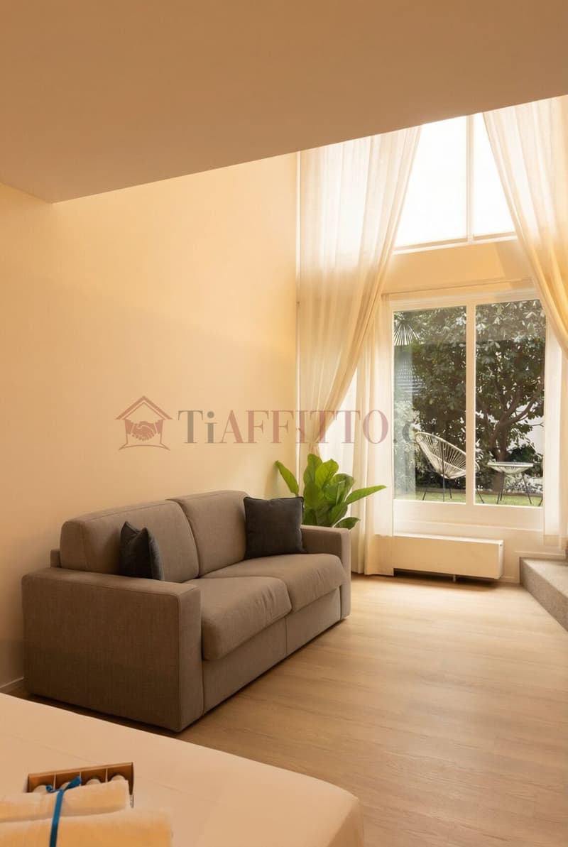 SPLENDIDO DUPLEX CON GIARDINO NEL CUORE DI LUGANO (13)