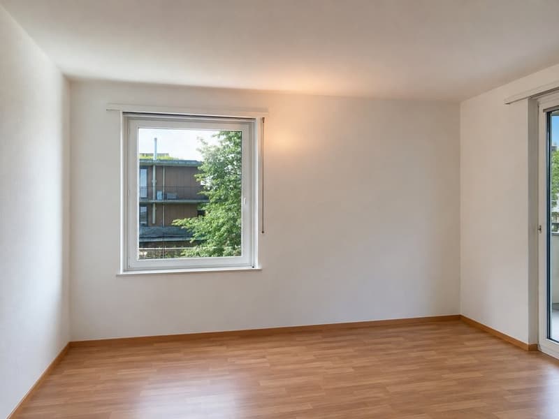Wohnzimmer mit Balkon