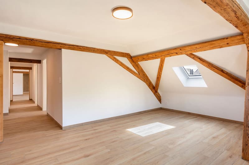 Salon & accès chambres