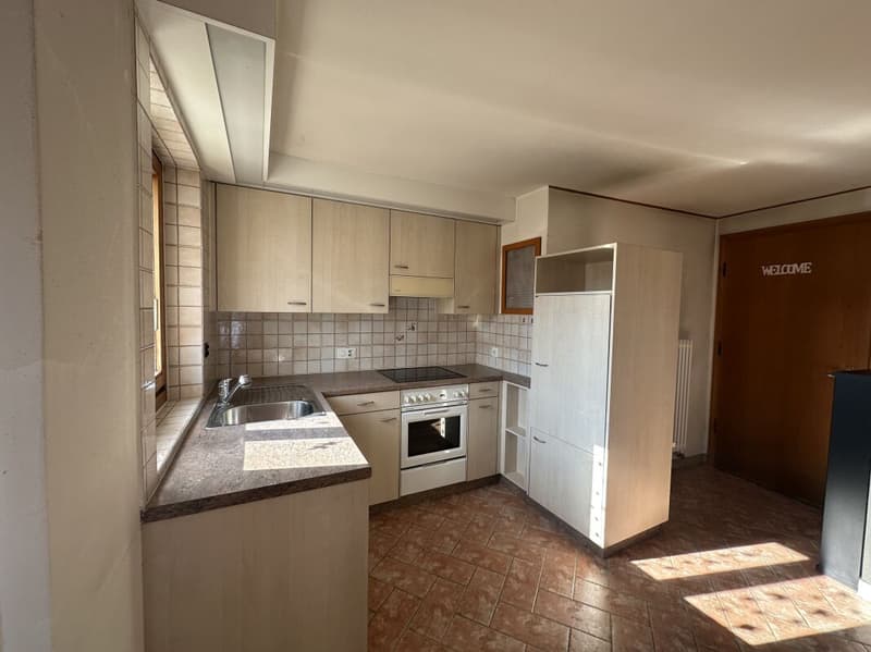 Appartement caractéristique de 2.5 pièces, dans une zone servie (10)