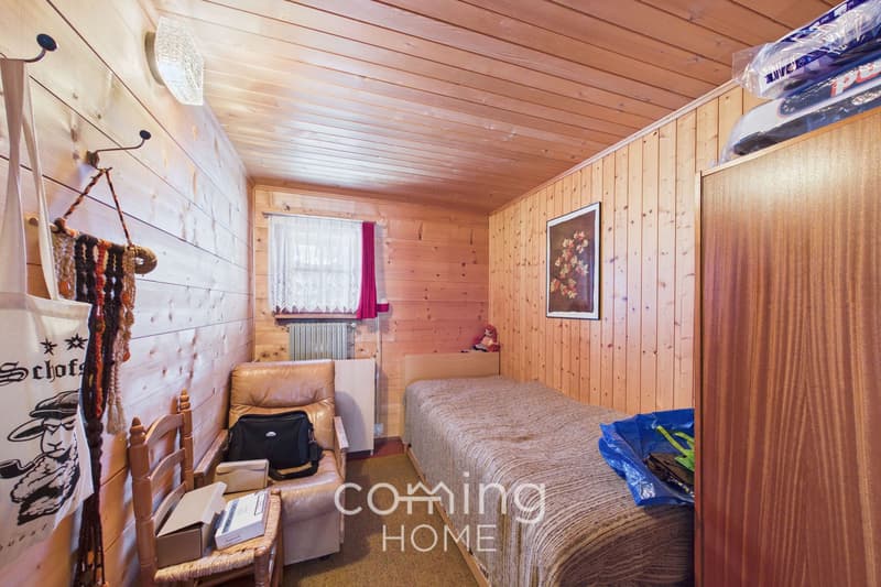 Traumhaftes Chalet mit Weitblick, 2 Wohnungen & Baulandreserve in Bürchen (12)