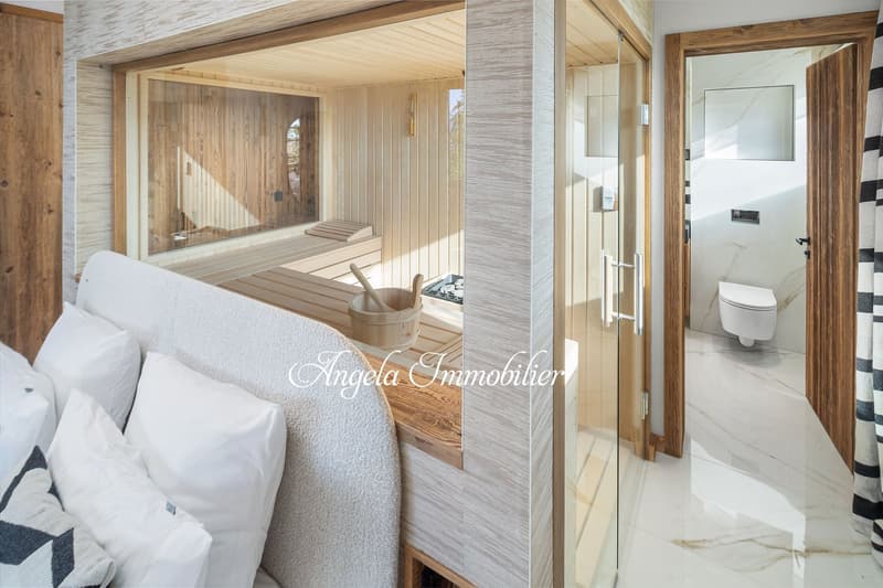 wooden sauna, white couch, white pillows, marble floor, glass door, toilet