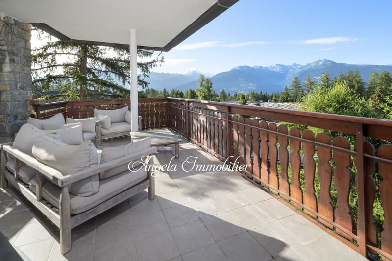 wooden railing, wooden floor, white cushions, wooden sofa, wooden table, mountain view