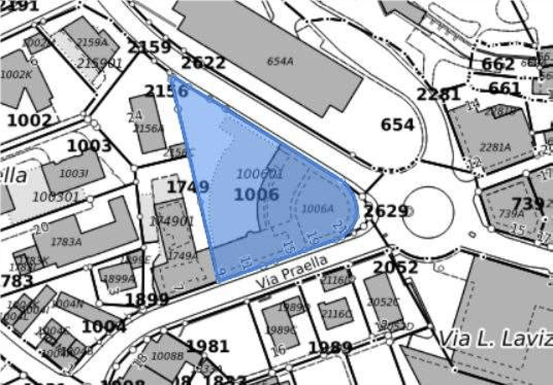 A map of a city block with various numbered plots and streets.