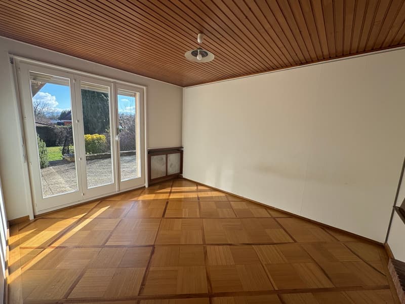 wooden parquet flooring, sliding glass doors, wooden ceiling, heating unit, exterior view