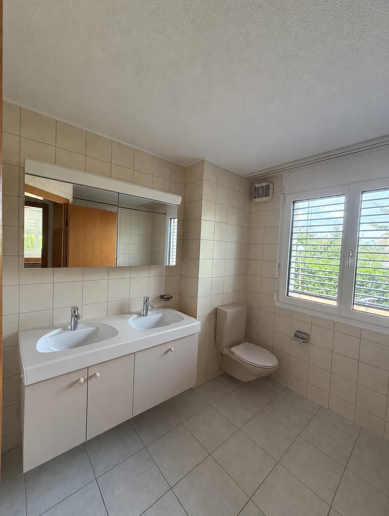 Appartement en rez-de-chaussée de 3,5 pièces lumineux avec espace de jardin (10)