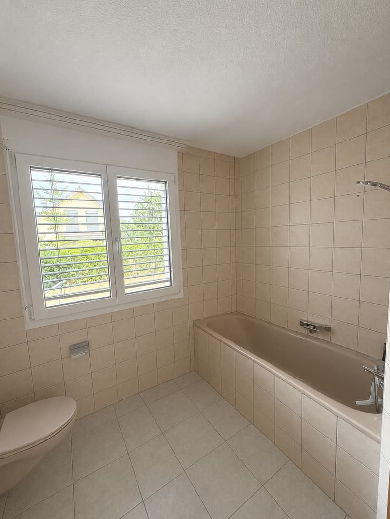 Appartement en rez-de-chaussée de 3,5 pièces lumineux avec espace de jardin (11)