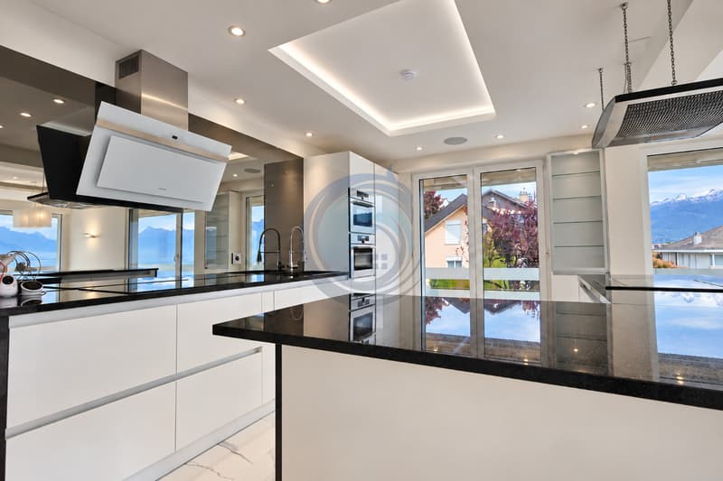 MAGNIFIQUE APPARTEMENT DE STANDING DE 4,5 PIÈCES AVEC VUE SUR LE LAC (9)