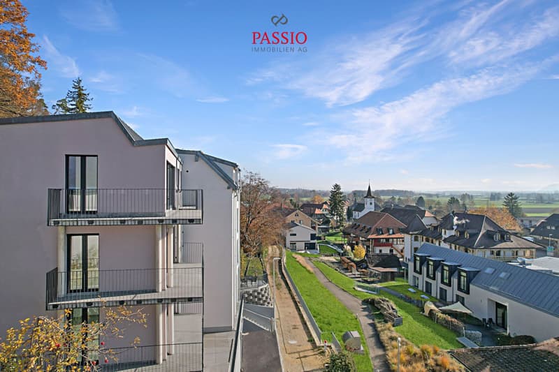 Habitation moderne avec vue panoramique : Appartement neuf de 5.5 pièces à Gampelen (1)