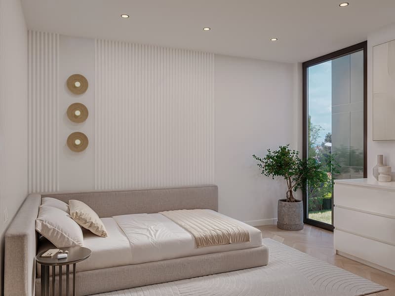Bedroom with bed, two nightstands, carpet, plant, glass door, and white wall with decorative elements