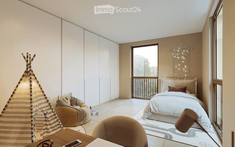 Spacious bedroom with large windows, white walls, wooden floors, built-in closets, a cozy seating area with a bean bag chair, and a balcony overlooking the outdoors. The room is decorated with a patterned rug and a decorative teepee-style lamp.