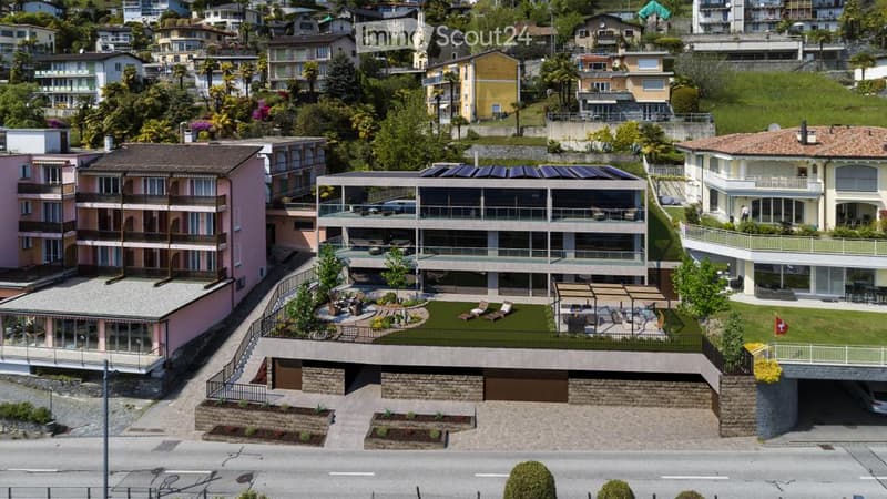 Apartment building, modern design, multiple levels, swimming pool, solar panels, terraces, balconies, garden area