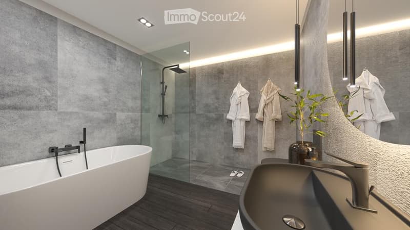 Modern bathroom with large bathtub, glass shower enclosure, modern lighting, gray tiles, sleek faucet, mirror, towels