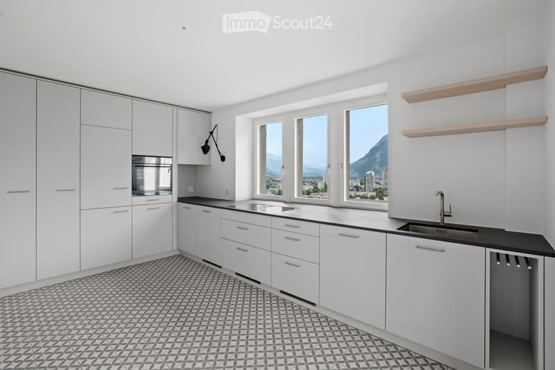 White cabinets, black countertops, built-in oven, dishwasher, sink, open shelves, tiled floor, modern design, natural light