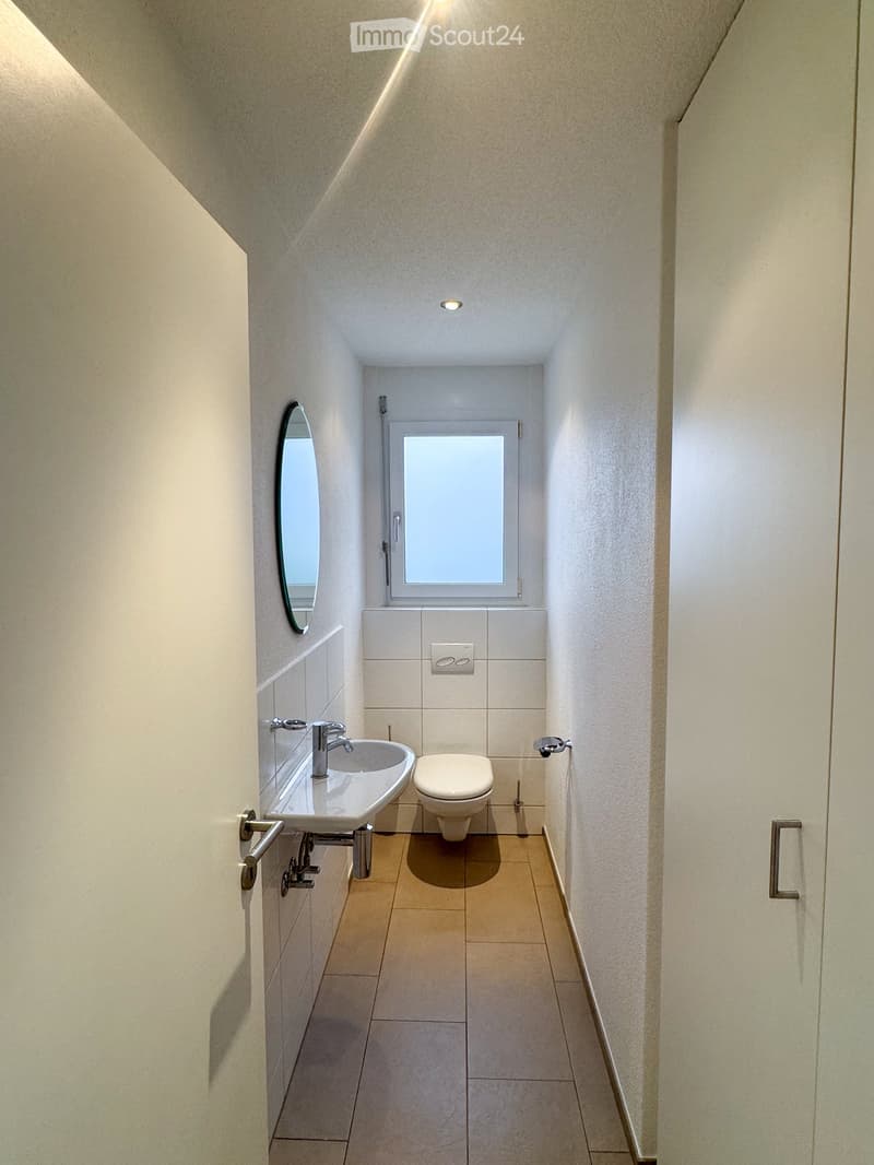 small bathroom, sink, toilet, mirror, window, tiled floor