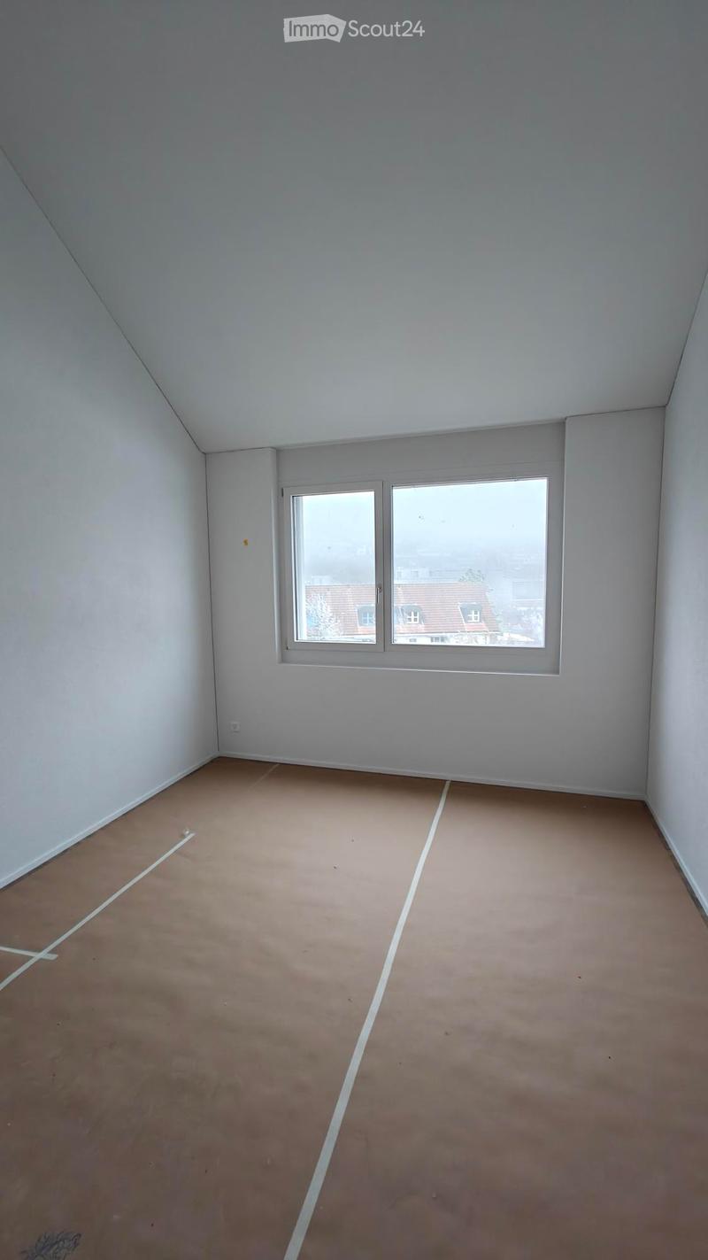 empty room, white walls, white ceiling, large window, brown floor