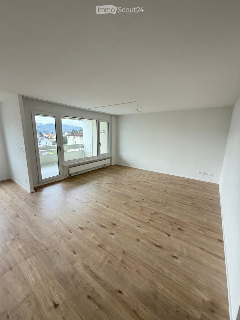 empty room, hardwood floors, large windows, balcony, power outlets, sliding glass door