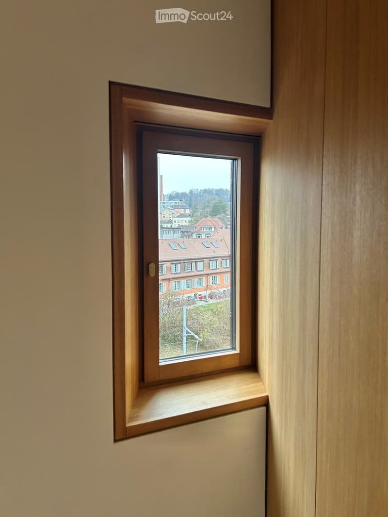 corner window with city view