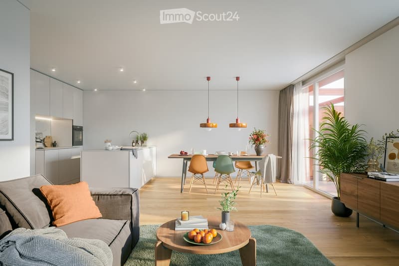 modern living room with wooden floor, white walls, dining table, couch, coffee table, plants, kitchen area