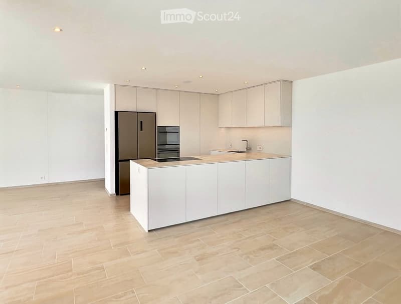 modern kitchen with white cabinets, tiled floor, stainless steel appliances, island with sink and faucet