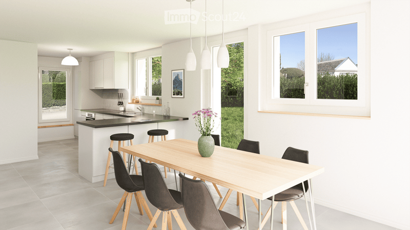 Open concept dining room, kitchen with center island, and living room.