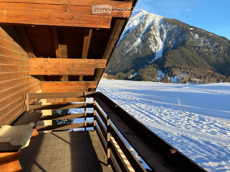 wooden balcony, wooden bench, wooden railing, snowy mountain view