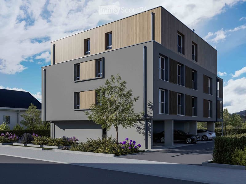 3 story building, gray exterior, brown wooden panels, underground garage, car parked