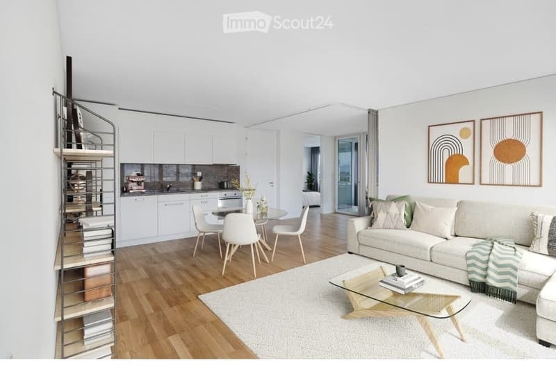 modern living room with white walls, wooden floor, white couch, glass table, dining table, white chairs, white kitchen cabinets, spiral bookshelf, white rug, artwork