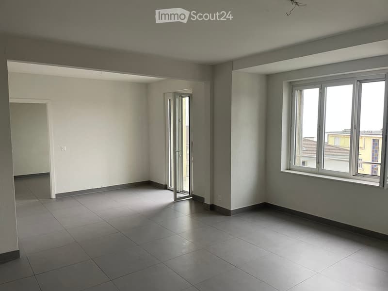 empty room, white walls, tiled floor, sliding glass door, large window, balcony