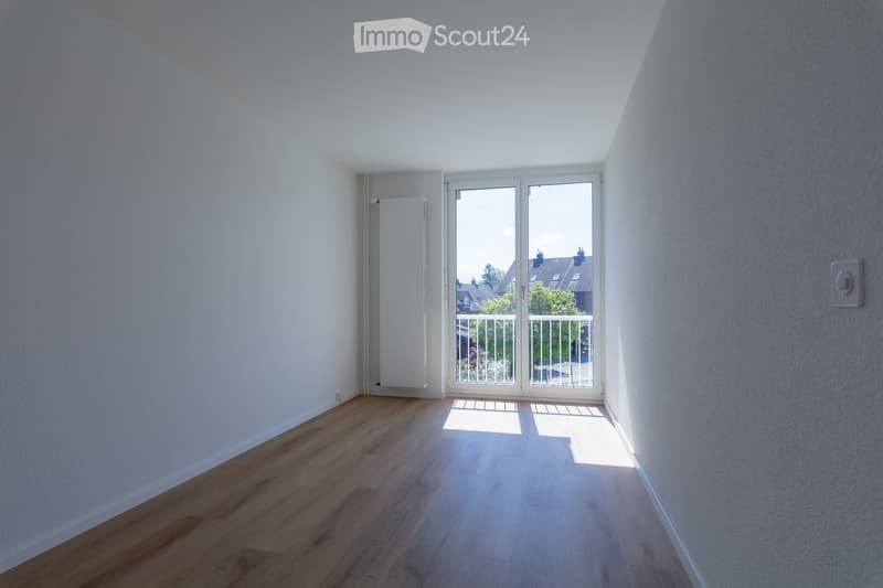 empty room, white walls, wooden floor, sliding glass door, balcony